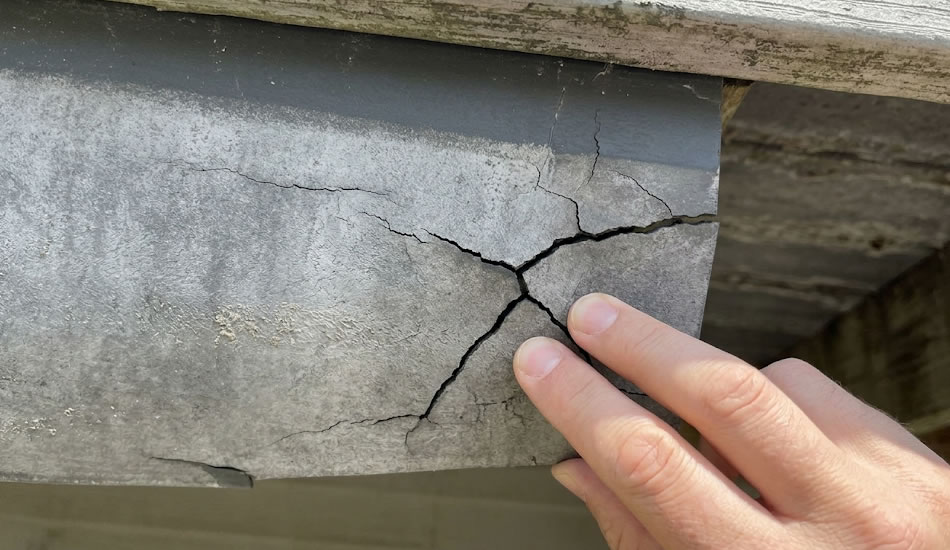 Faded, brittle, or cracking decking materials.